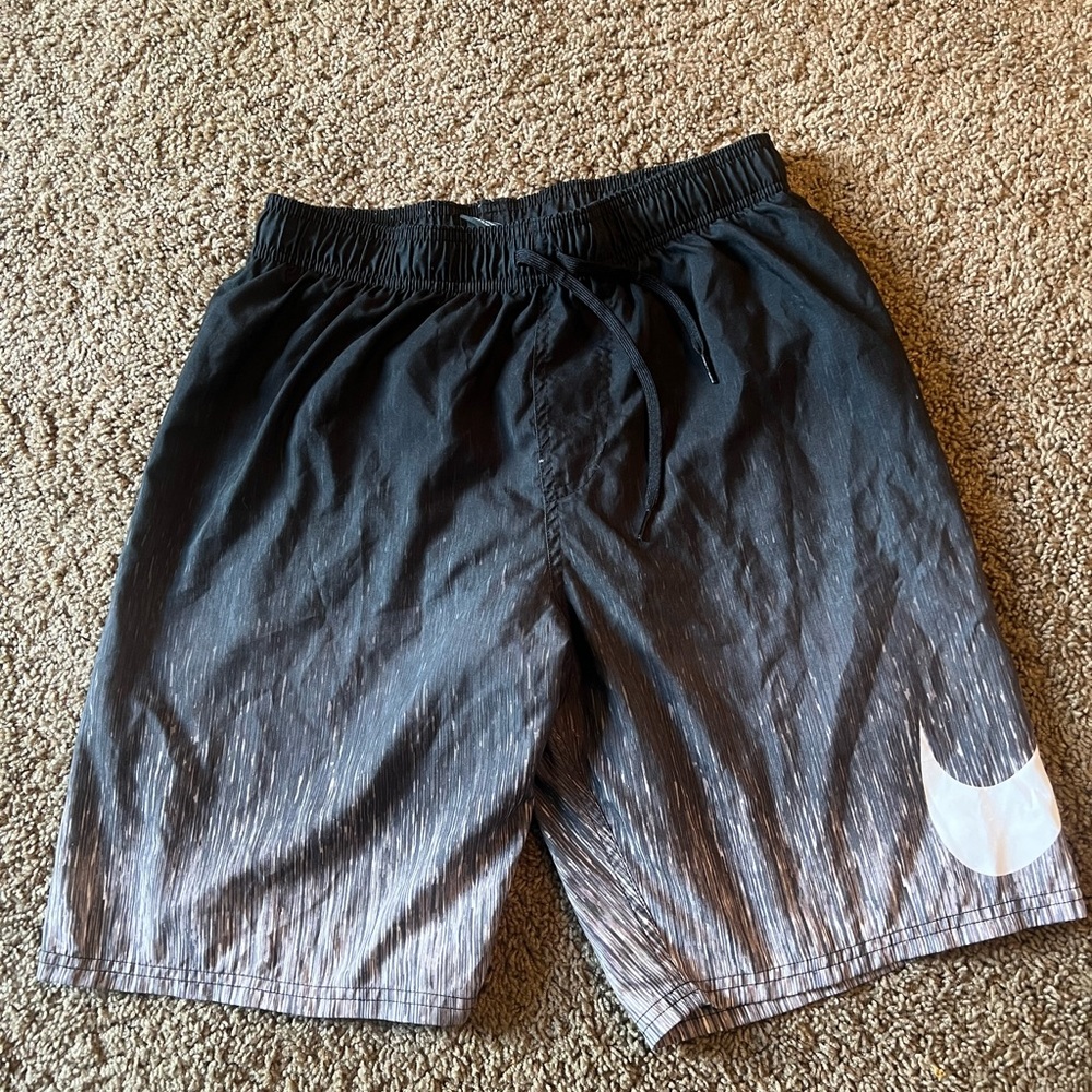 Nike swim trunks w/mesh liner.  Size Medium.  Great condition.